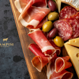 cured meats, types of italian salumi, salumi vs charcuterie, Salumi plate, salumi set, arranged salami bologna ham and prosciutto, arranged salami bologna boiled ham and prosciutto