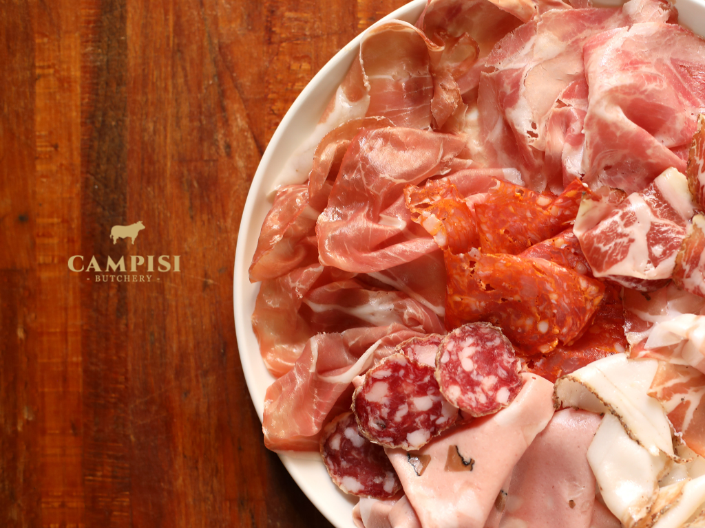 cured meats near me cured meats, types of italian salumi, salumi vs charcuterie, Salumi plate, salumi set, arranged salami bologna ham and prosciutto, arranged salami bologna boiled ham and prosciutto