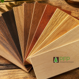 Timber veneer samples displayed beside product specifications and responsible sourcing documentation