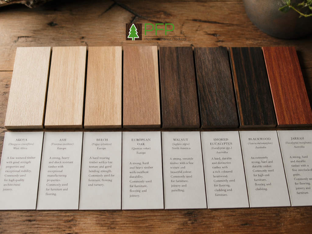 American oak, dark wenge and figured burl timber veneer samples displayed side by side to compare natural wood grain patterns