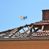 Roofing contractor inspecting damaged roof tiles and flashing to assess the extent of storm-related repairs. emergency roof repair sydney roof leak repair cost, tile roof repair sydney, storm damage roof repair, roof repairs sydney, roof refurbishing sydney, emergency ceiling leak repair, metal roof repair cost